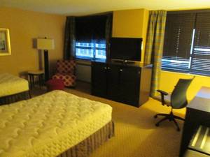 lot 51 image: Room 1404. 2 Full Beds, Marble Circle Nightstand, TV 42 LG, Small Safe, & More