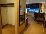 Room 1600: King bed, TV, Mini-Fridge, Desk, TV Stand, Side Chair and Ottoman, Floor Lamp, Night Stand, Etc.