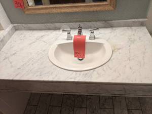 lot 357 image: Small Marbled White Vanity w Sink