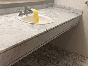 lot 425 image: Large Marbled White Bathroom Counter with Silver Sink