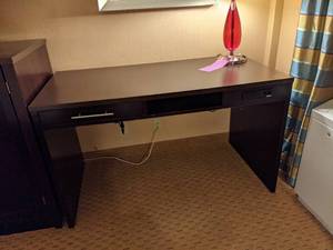 lot 535 image: Computer Desk w Built In Outlets & Red Teardrop Lamp