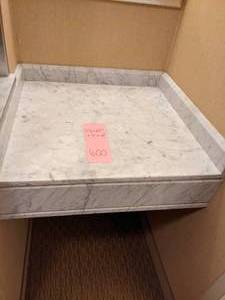 lot 600 image: White Marbled Bathroom Vanity Counter