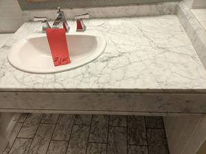 lot 315 image: Small Elegant Marble Counter with Sink