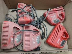 lot 554 image: (5) Milwaukee 12 Volt Chargers...