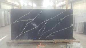 lot 16 image: (1) Slab Silestone Eternal Marquina...