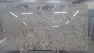 lot 23 image: (1) Slab Granite Biscotti White, 77...
