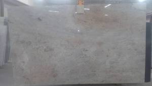 lot 26 image: (2) Slabs Ivory Gold (Millineum Cre...