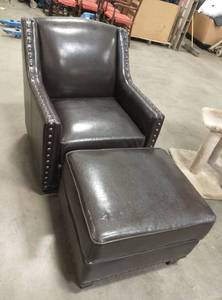lot 8 image: Nailhead Chair and Ottoman - one small tear on the left side of the chair otherwise in good condition