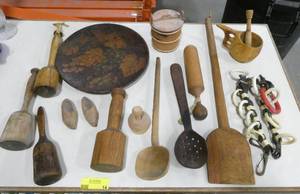 lot 14 image: Nice group of primitive wooden spoons, mashers, cookie press and more