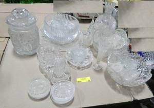 lot 30 image: Large group of clear cut glass items - cookie jar, serving plate, bowls, vases etc