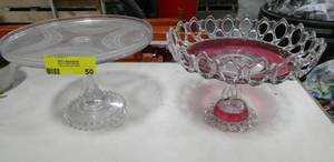 lot 50 image: Clear glass cake plate and a red and white unique fruit bowl