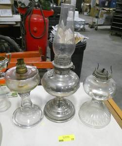 lot 77 image: 3 large hurricane lamps, 2 glass and one very nice steel one