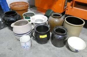 lot 115 image: Another group of stoneware pitchers, crocks, vases