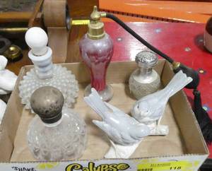 lot 118 image: A vintage atomizer, 3 perfume bottles and a ceramic bird figurine
