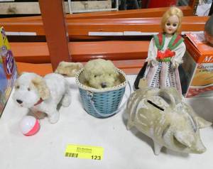 lot 123 image: 2 Vintage wind up dogs, one walks and the other spins around in his basket, pig bank and doll