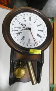 lot 129 image: An Unger date and time wall clock - untested