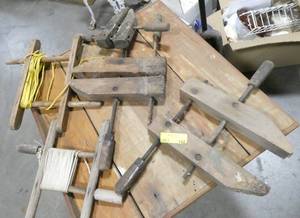 lot 142 image: Group of wood clamps and rope holders