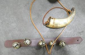 lot 153 image: Black powder horn and reindeer bells
