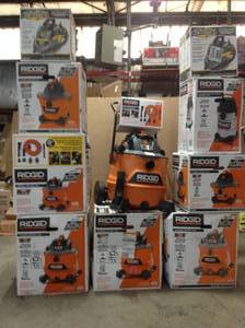 Pallet with assorted Ridgid WetDry vacs open boxes customer returns  see pictures