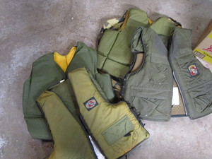 Stearns vests (4) with bag...