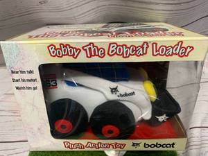 lot 13 image: Bobby The Bobcat 863 Loader Plush Toy