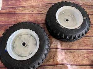 lot 73 image: Lot of Two Goodyear Four Point 103.506 Studed Tread Tires