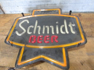 Schmidt neon like lighted sign and ...