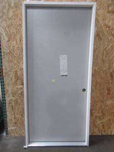 lot 411 image: Masonite 36 x 80 Steel Interior Utility Door In Grey, Single Bore, LH In-swing. - Scratch and Dent.