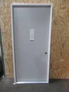 lot 412 image: Masonite 36 x 80 Steel Interior Utility Door In Grey, Single Bore, LH In-swing. - Scratch and Dent.