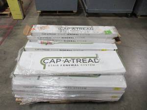 lot 335 image: Pallet Of Cap A Tread Laminate Stair Covers And Risers (14 boxes of Caps & 5 Boxes Of White Risers)