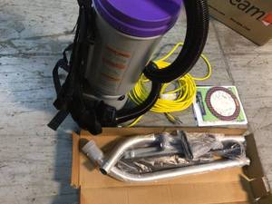 Super CoachVac 10 Qt. Commercial Backpack Vacuum Cleaner with Xover Multi-Surface 2-Piece Wand Tool Kit by ProTeam Customer Returns See Pictures