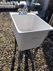 lot 821 image: E.L. Muster & Sons Utilatub 12 Utility Sink  with Fixtures