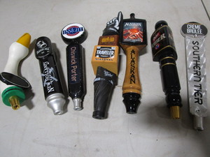 Tap handles with Dragons Milk, Goo...