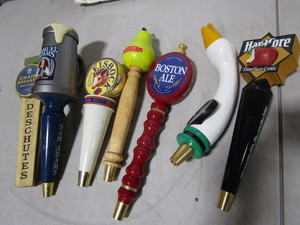 Tap handles with Coors, S. Adams, H...