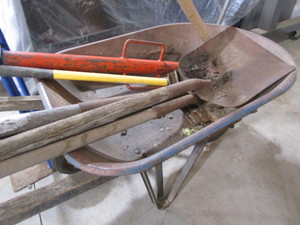 Wheelbarrow with tamper, post drive...