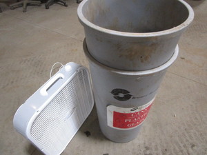 Lasko box fan, two recycle cans...