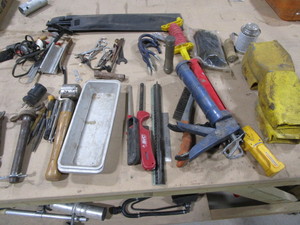 Punches, pins, caulk guns, ladder p...