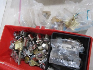 Cabinet and cylinder lock component...
