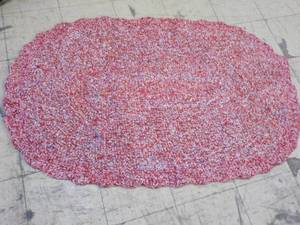 lot 31 image: Oval Braided Rug 38 x 60...
