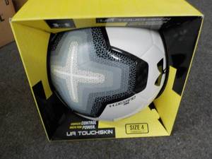 lot 44 image: Under Armour size 4 Ball...