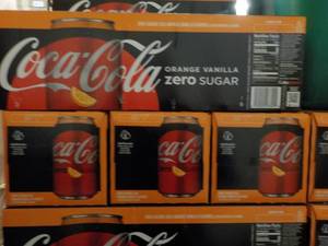 lot 266 image: 4 packs Coca Cola Orange Vanilla Ze...