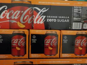 lot 267 image: 4 packs Coca Cola Orange Vanilla Ze...