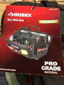 lot 9 image: Husky 18 in. Tech Tool Bag  Customer Returns See Pictures