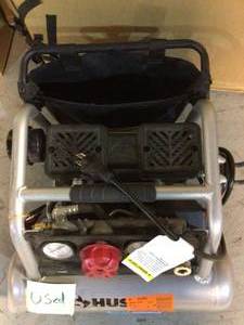 lot 49 image: Husky 1 Gal. Portable Electric-Powered Silent Air Compressor   USED Customer Returns See Pictures