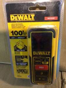 lot 56 image: DEWALT 100 ft. Laser Distance Measurer Customer Returns See Pictures