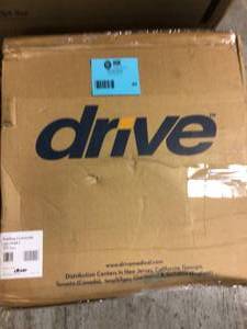 lot 65 image: Drive Medical Folding Steel Bedside Commode Customer Returns See Pictures