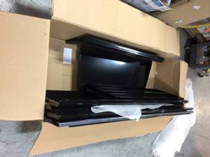 lot 109 image: Ready-to-Assemble 24-Gauge Steel Freestanding Garage Cabinet in Black (48 in. W x 72 in. H x 18 in. D) by Husky For Parts Customer Returns See Pictures
