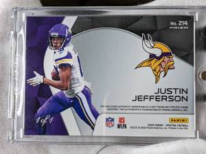 lot 104 image: Justin Jefferson Gold Disco Spectra 11 Autographed Patch Football Rookie Card