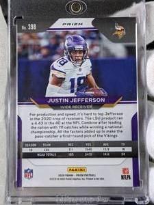lot 115 image: Justin Jefferson Prizm Orange Disco Special Insert Football Rookie Card