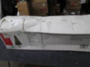 lot 64 image: 6 ft prelit ilfe like christmas tre...